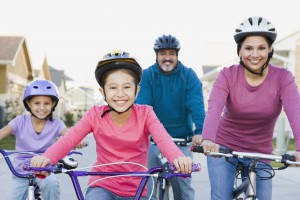 Family riding bicycles together