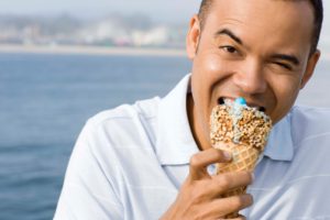 Man eating ice cream cone