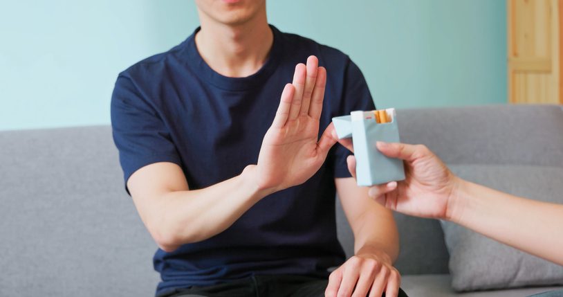 Stroke Prevention Tips – Flushing Hospital Man making a gesture to say no to smoking